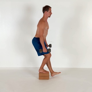 Weighted quarter pistol squat touchdown