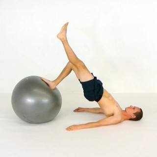 Stability ball single leg glute bridge
