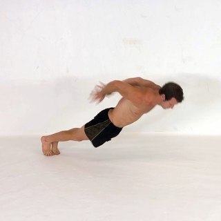 Behind-the-back clap pushup
