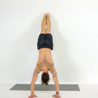 Incline wall handstand