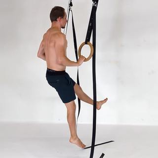 Assisted jumping pistol squat