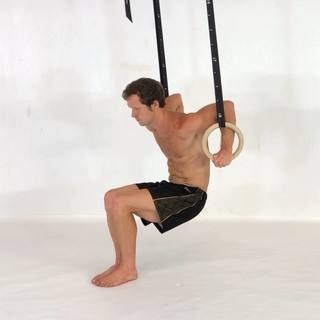 Leg-assisted rings dip