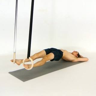Rings glute bridge straight legs
