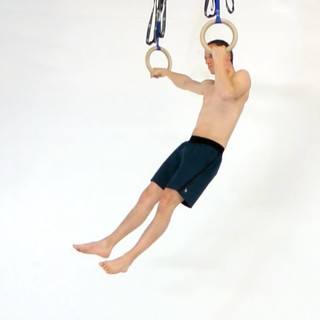 Rings archer pullup