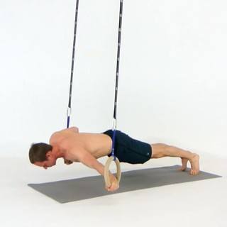 Rings archer pushup