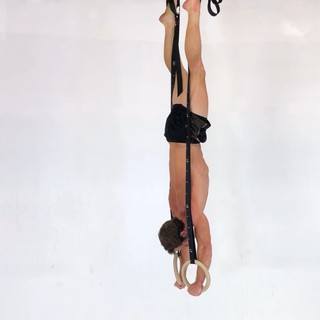 Rings strap handstand