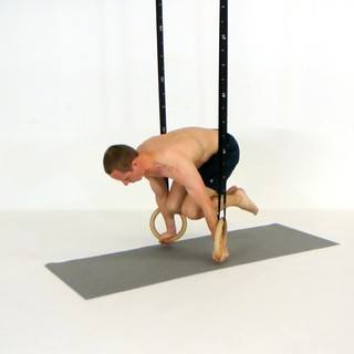 Rings tuck planche
