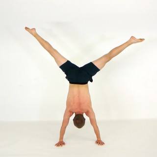 Straddle handstand