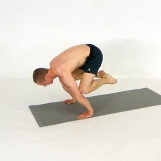 Straight-arm crow pose