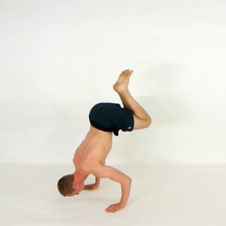 Tuck bent-arm handstand