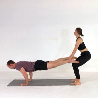 Wheelbarrow pushup with squat