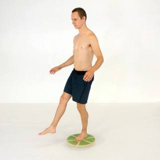 Wobble board one-leg stand