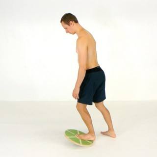 Wobble board calf stretch