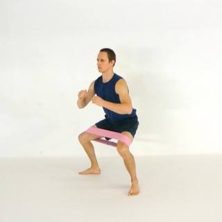 Banded lateral step-out squat
