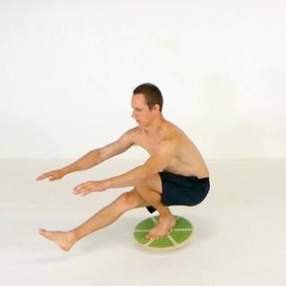 Wobble board pistol squat