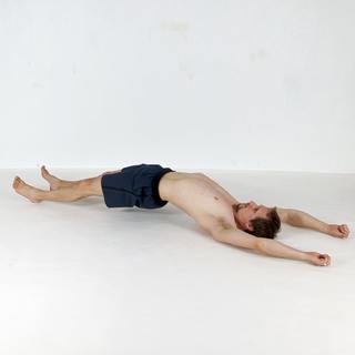 Supine arch to hollow body crunch