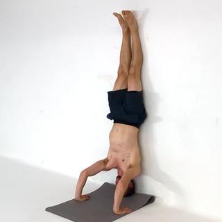 Wall tripod headstand