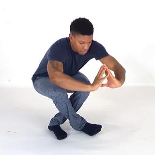 Corkscrew squat