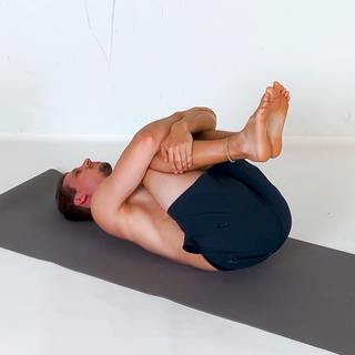 Knees to chest pose
