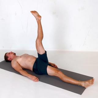Lying alternating leg raise