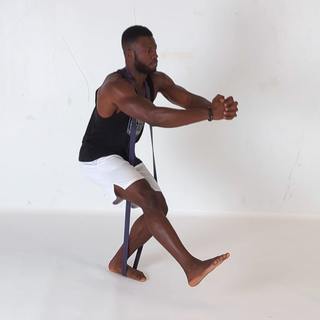Band-resisted pistol squat
