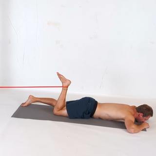 Banded hamstring curl lying