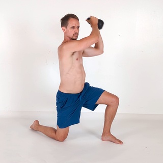 Kneeling woodchopper