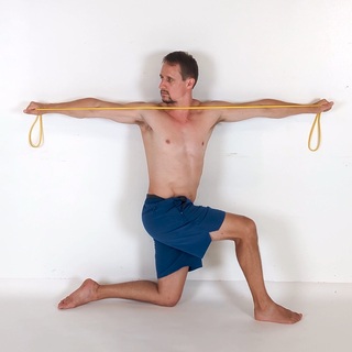 Banded half-kneeling thoracic rotation