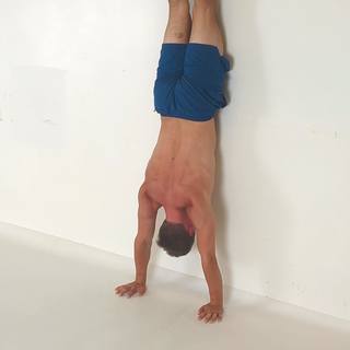 Handstand shoulder shrugs
