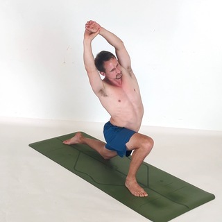 Kneeling lunge side bend