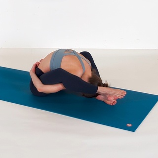 Sleeping tortoise pose with hands bound