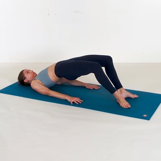Bridge pose with legs half extended