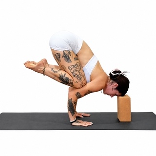 Crow pose with head support
