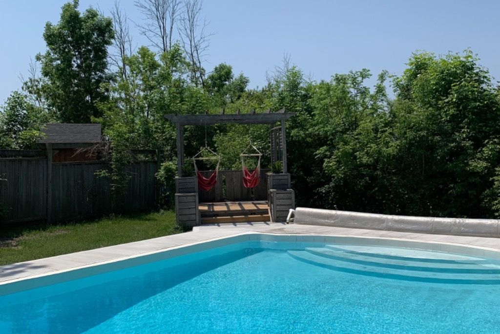 Cozy cabin w/ pool & hot tub photo 4