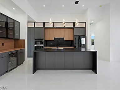 https://www.zillow.com/homedetails/2008-SW-3rd-St-Cape-Coral-FL-33991/103350186_zpid/ - Gallery Image 18