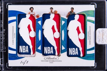 Anthony Edwards 2024-25 Panini Flawless Triple Logoman #TLO-CVA Cade Cunningham/Victor Wembanyama/Anthony Edwards Logoman Patch Card (#1/1) - Wembanyama/Edwards Jersey Number - Panini Encased card from Card Ladder