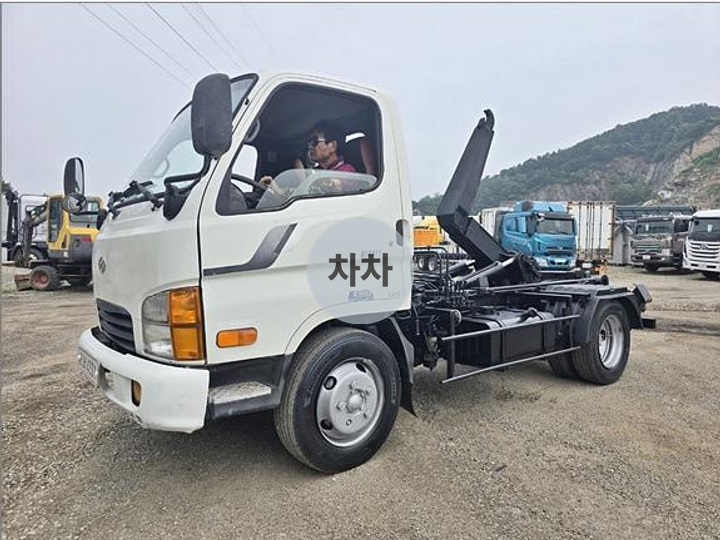 09년형 마이티 큐티 2.5톤 암롤 중고화물차