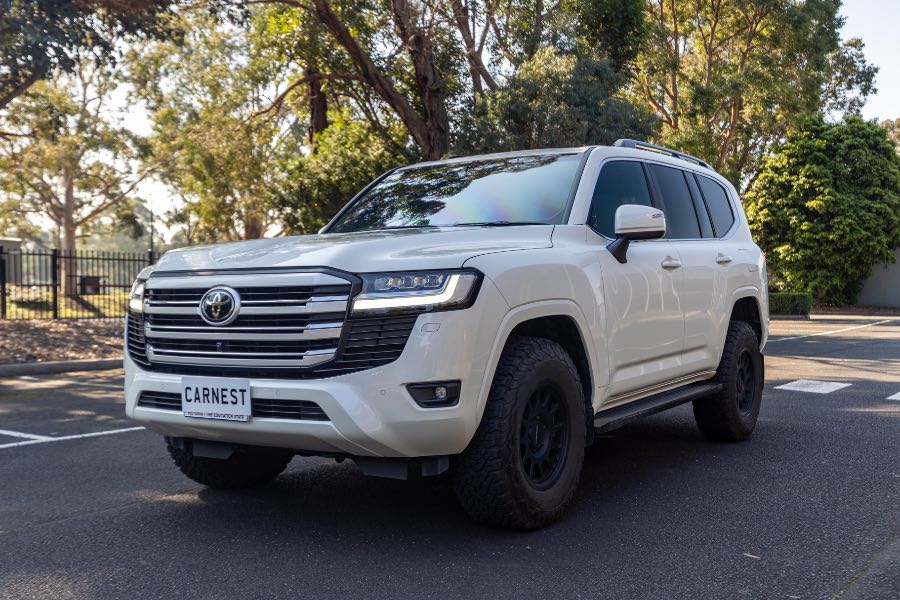 2023 TOYOTA LAND CRUISER VX rear exterior photo on CarNest