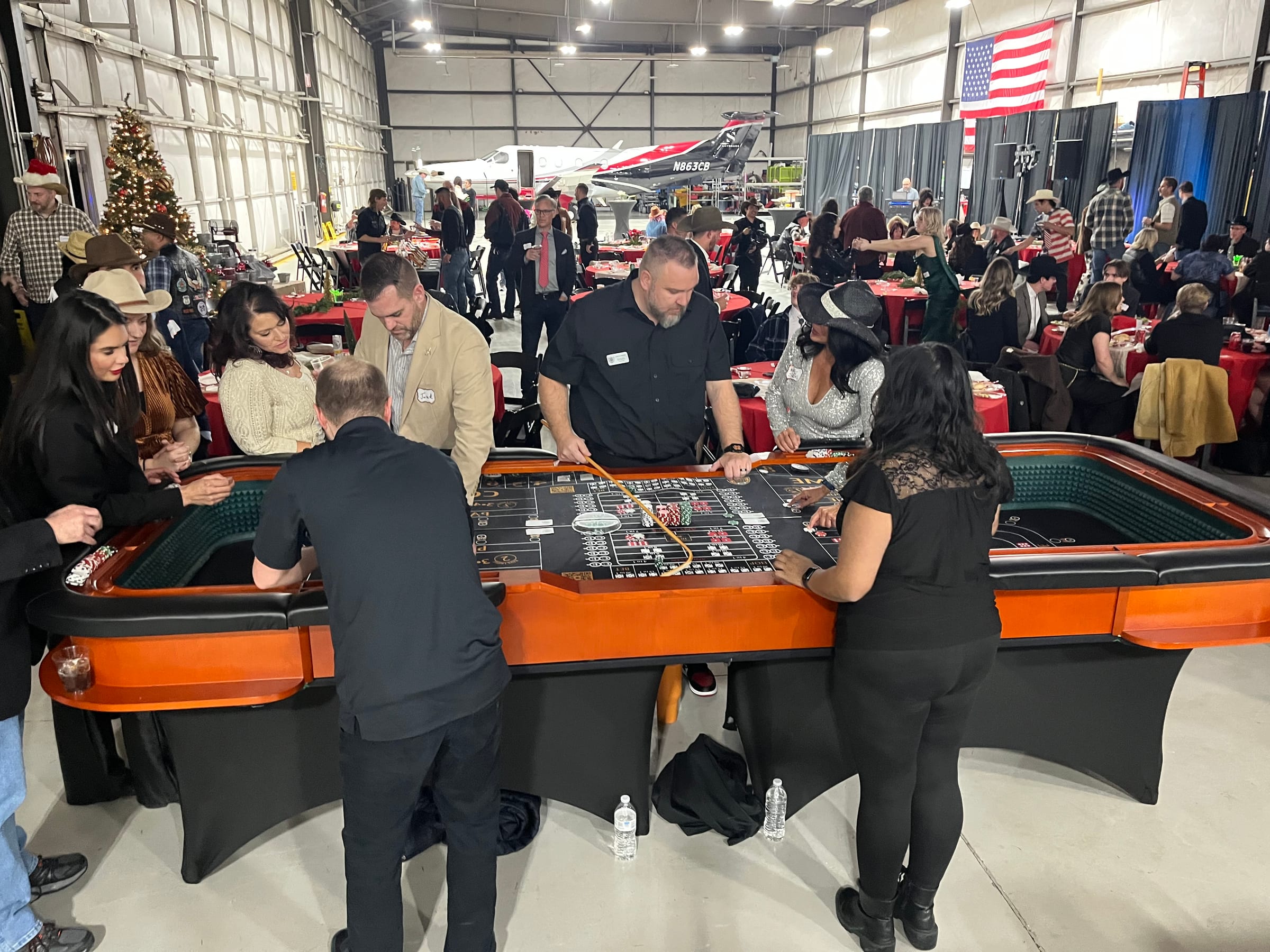 Casino tables and guests at CB Skyshare Holiday Party, a corporate casino party in Northern Utah