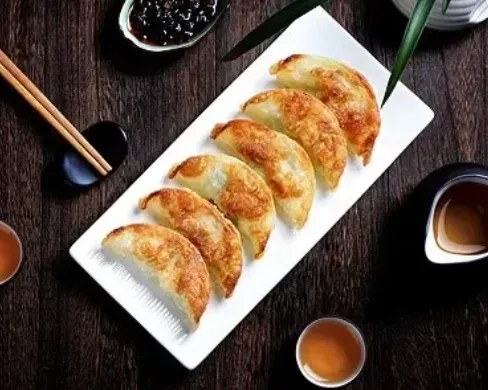 9. RAVIOLIS AU POULET FRIT 2p