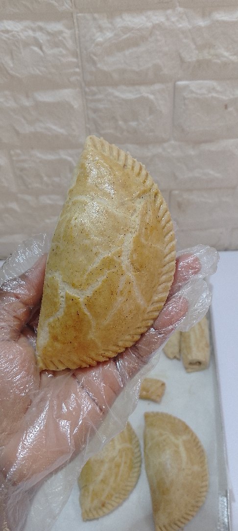 Meat pie with pure beef filling. No potatoes,no carrots....just beef and peppers. 2