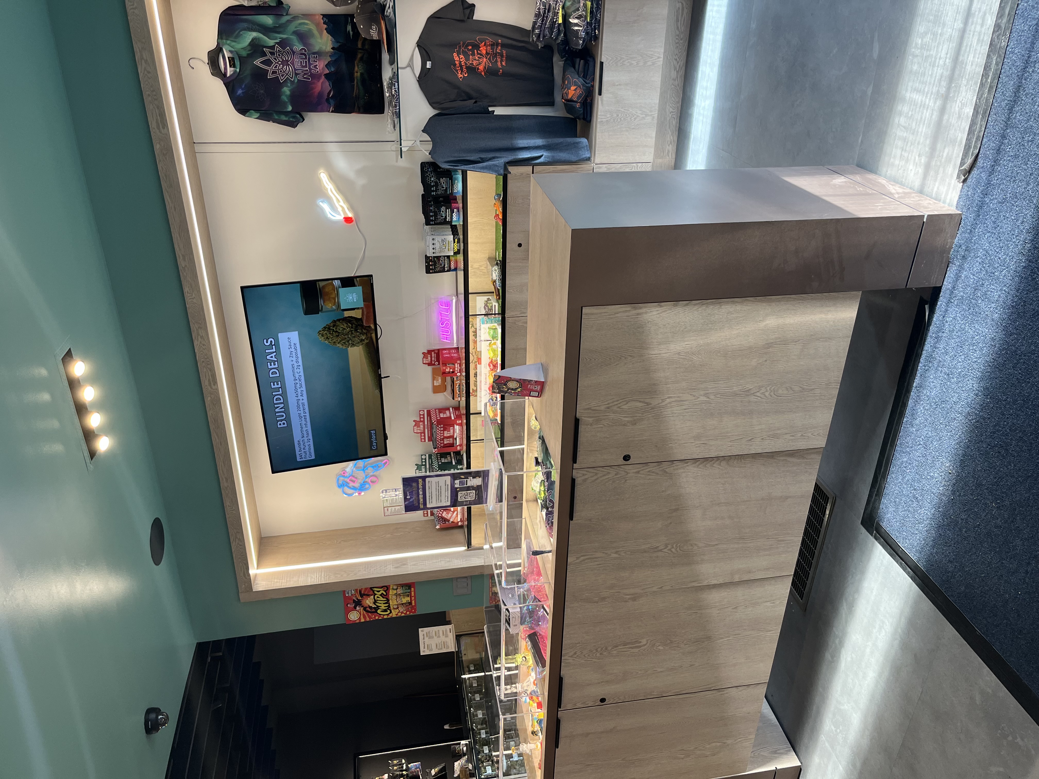Inside Meds Cafe Cheboygan — cannabis shopping area on N Main St