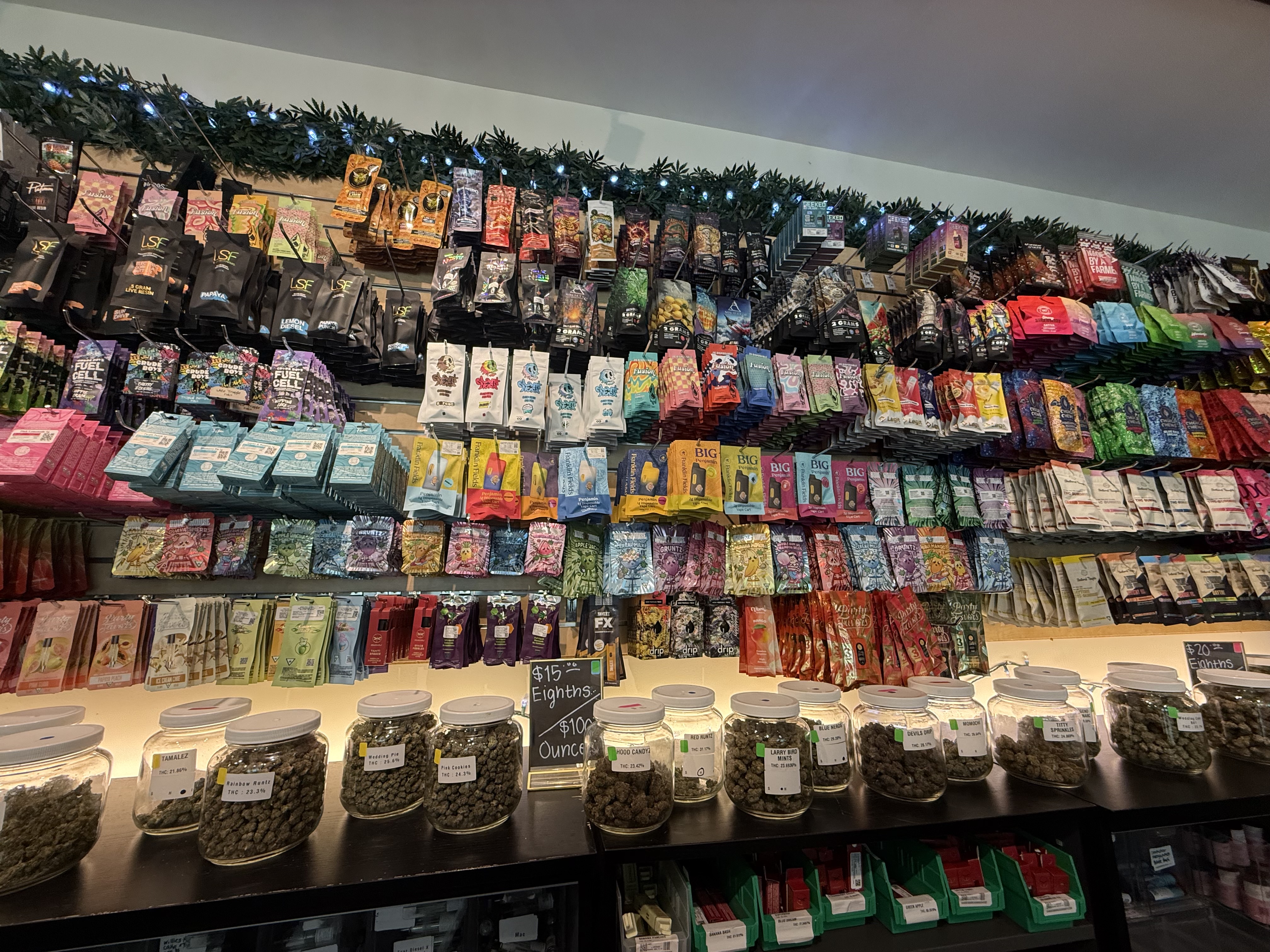 Meds Cafe Manistee — product shelves and cannabis selection