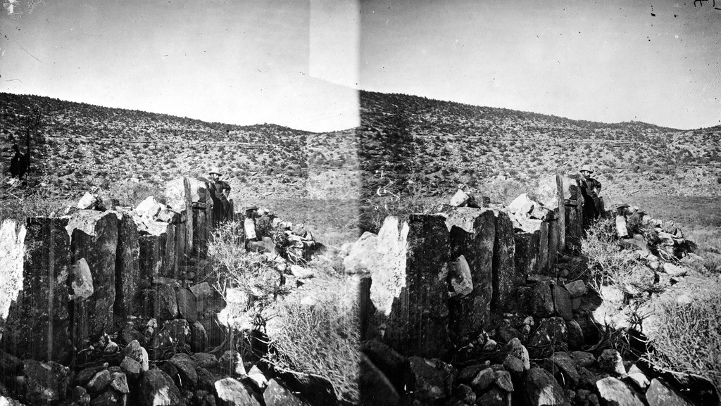 Ruins in Montezuma Canyon, E.A. Barber and Henry Lee in view. San Juan County, Utah. 1875.
