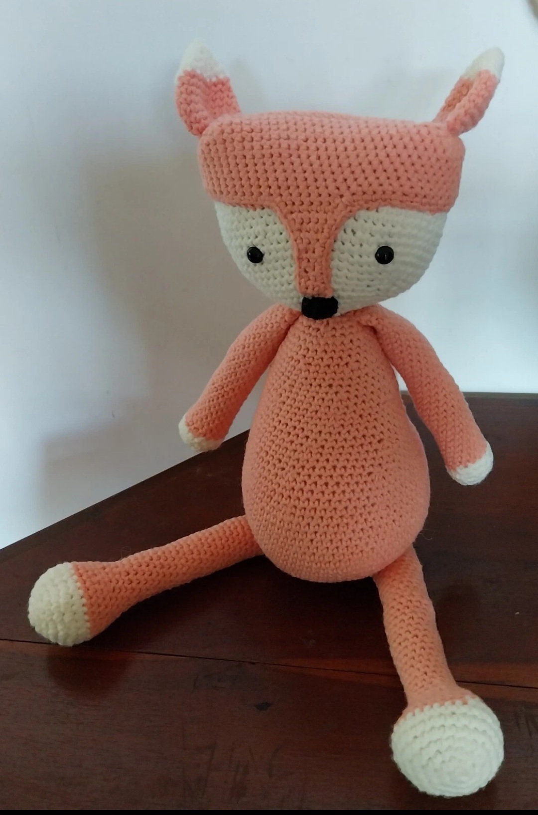 An amigurumi stuffed fox