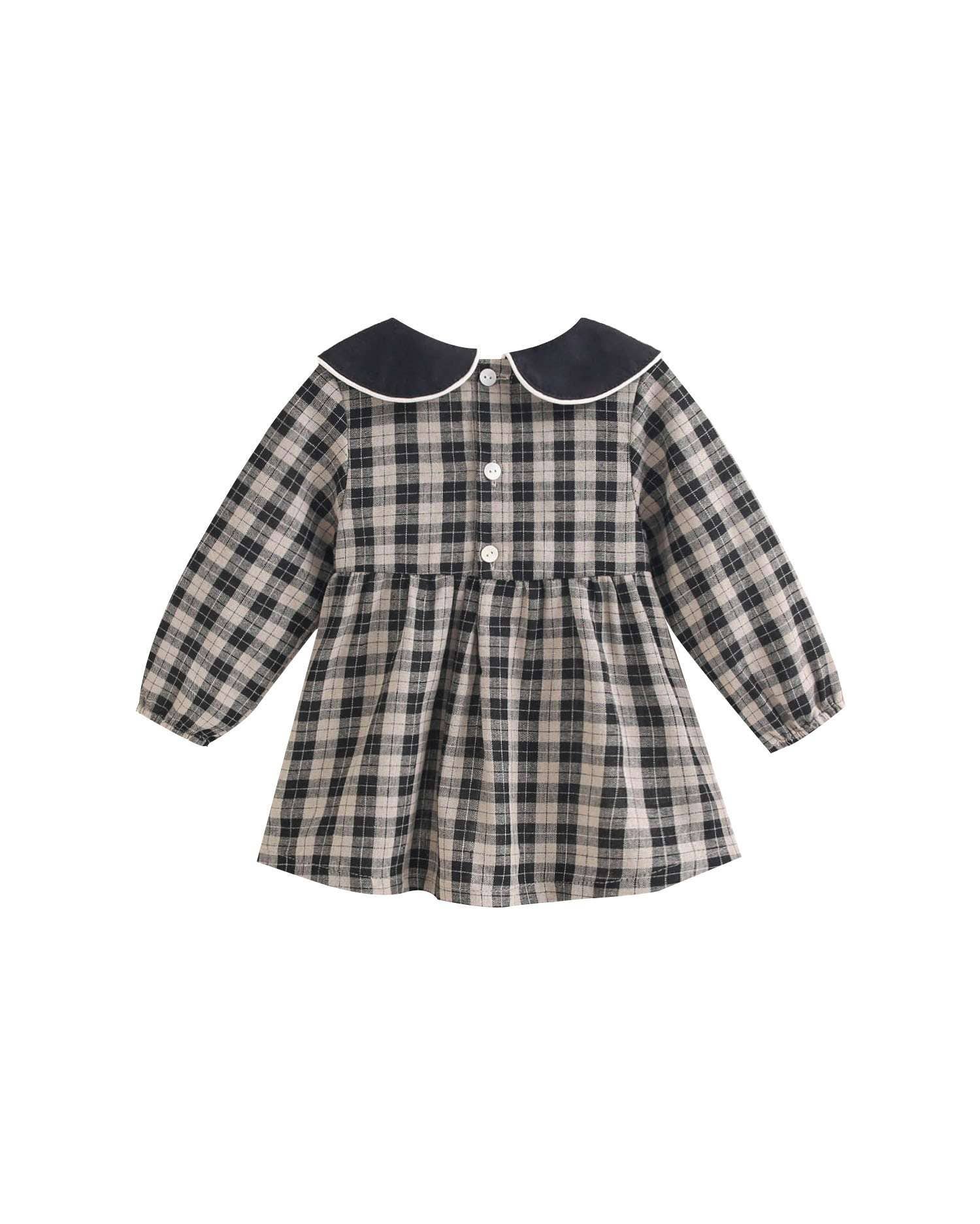 Robe pour bébé en beige clair et carreaux noirs — 12 mois