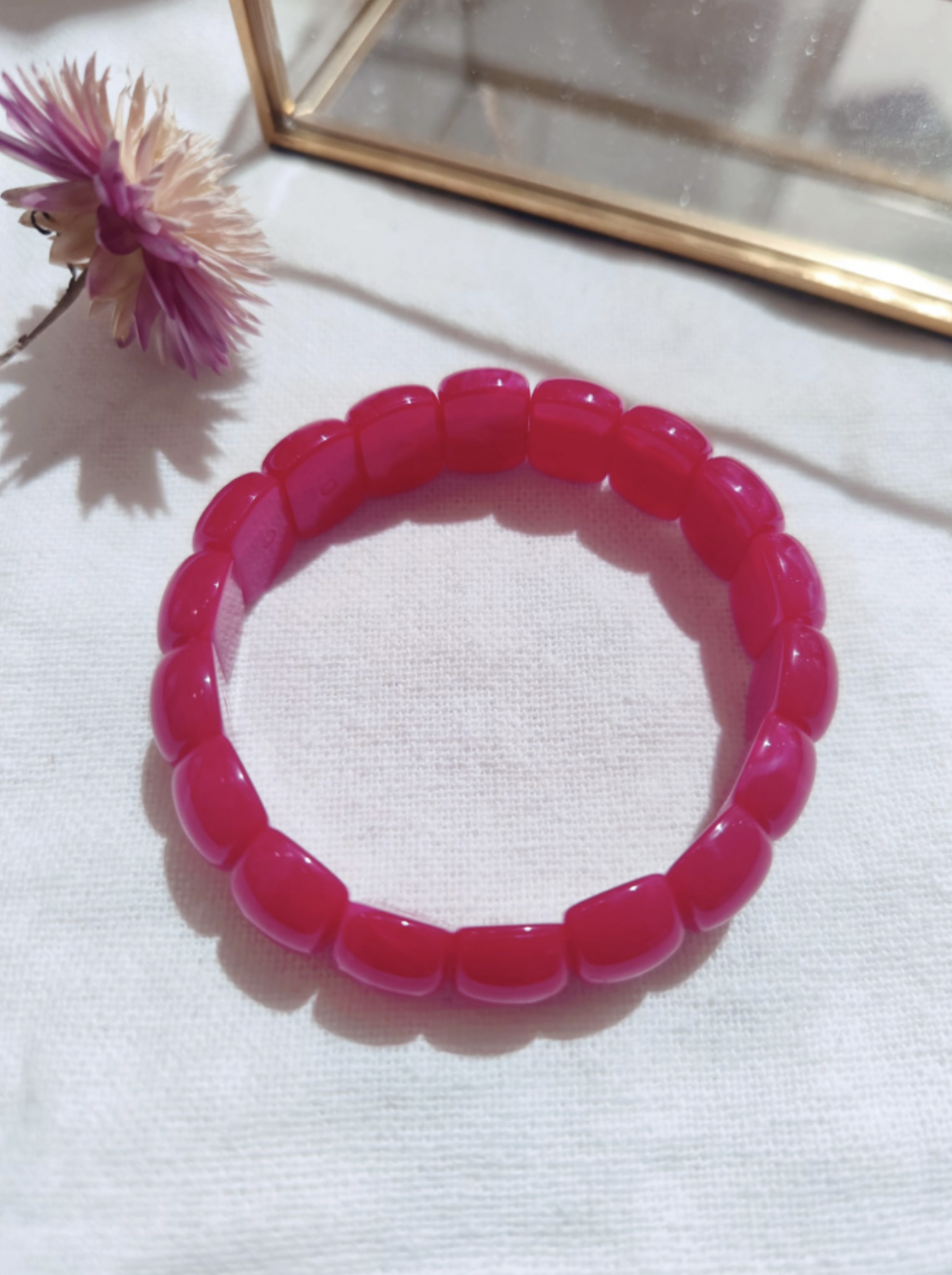 Bracelet élastique résine fushia