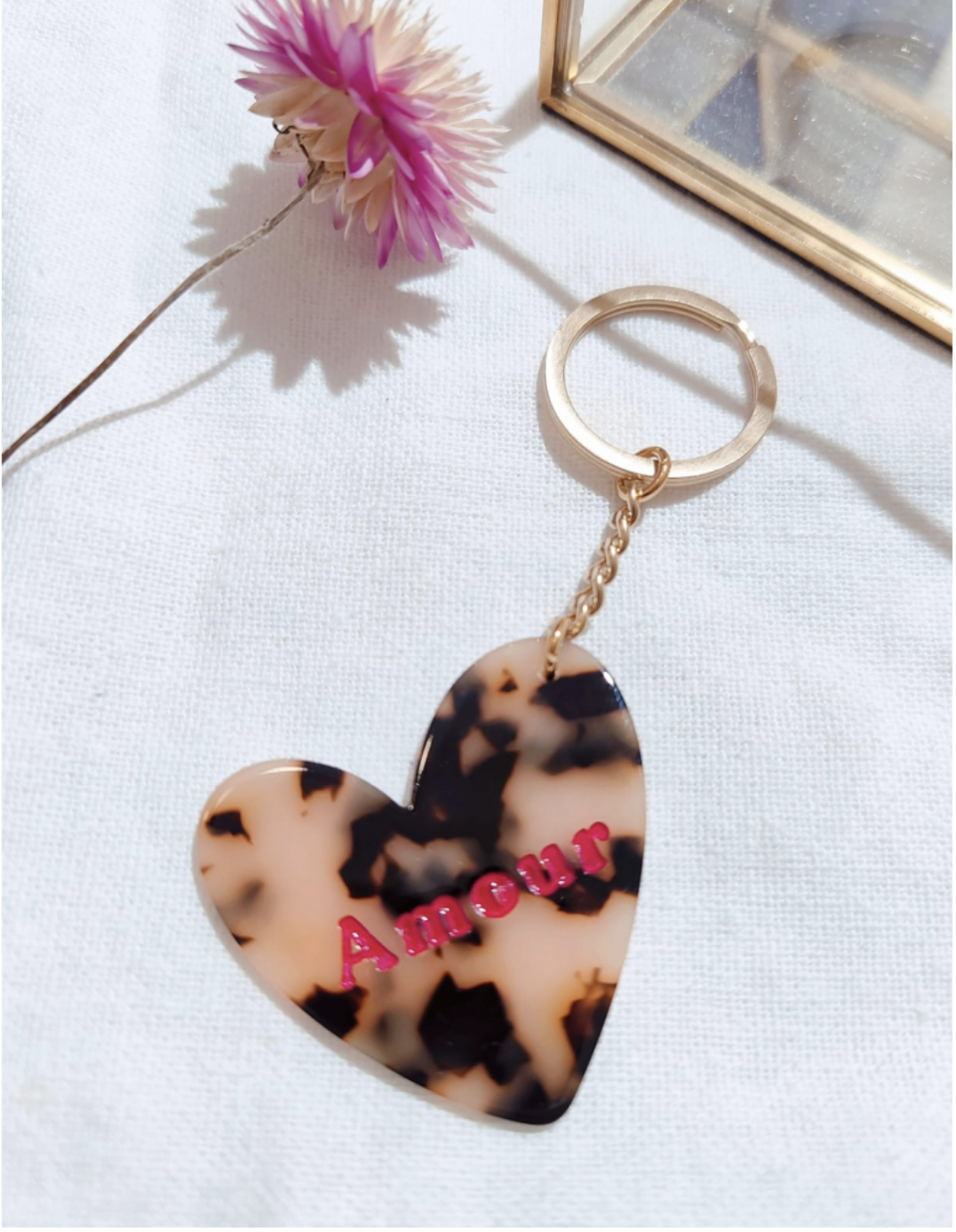 Porte clef résine paillettes "AMOUR" léopard