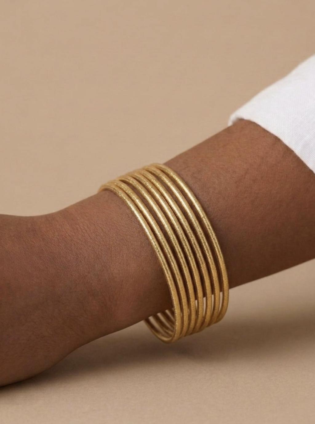 Bracelet 5 minis joncs brillants dorés