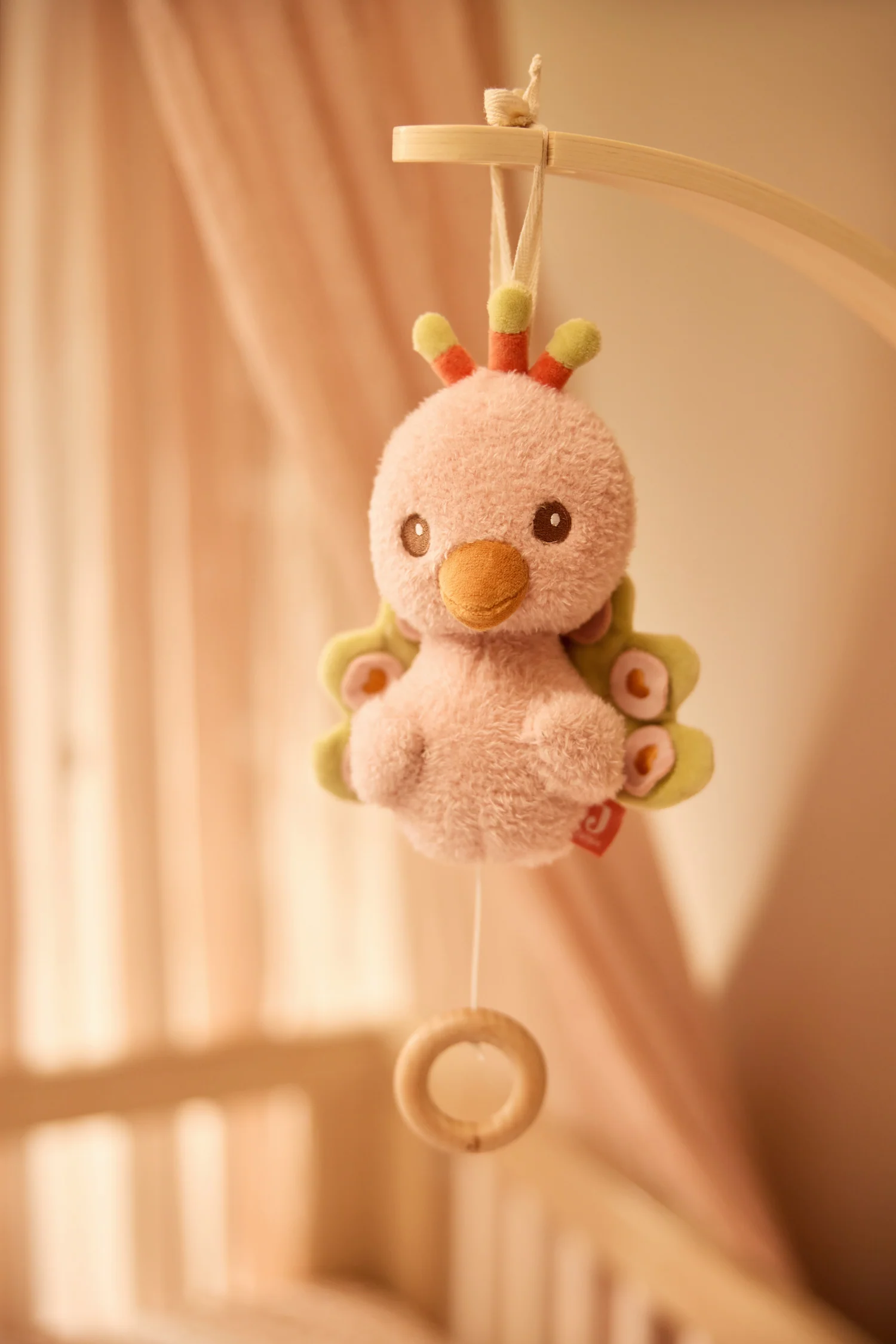 Peluche musicale - peacock pavie